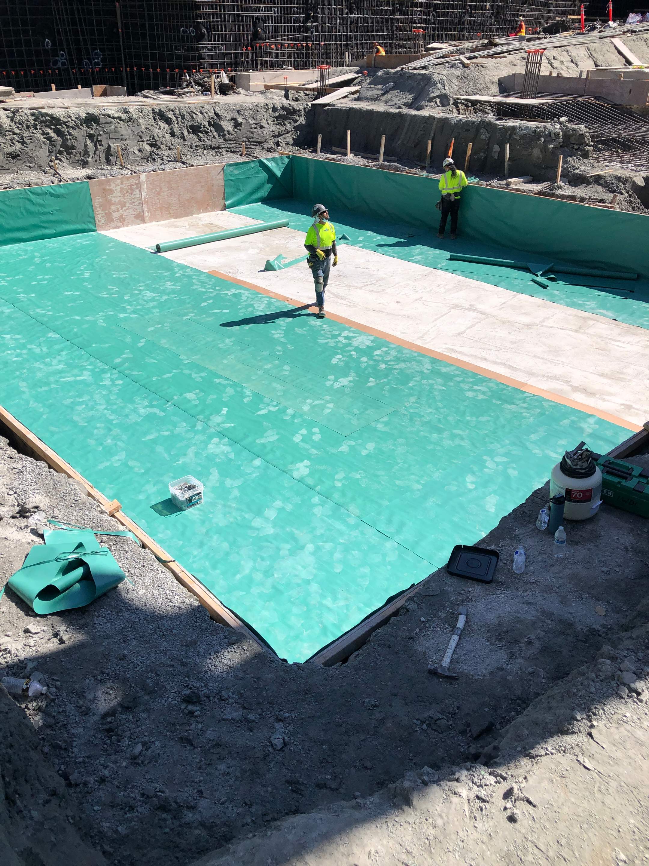 Slab-on-grade waterproofing installation.